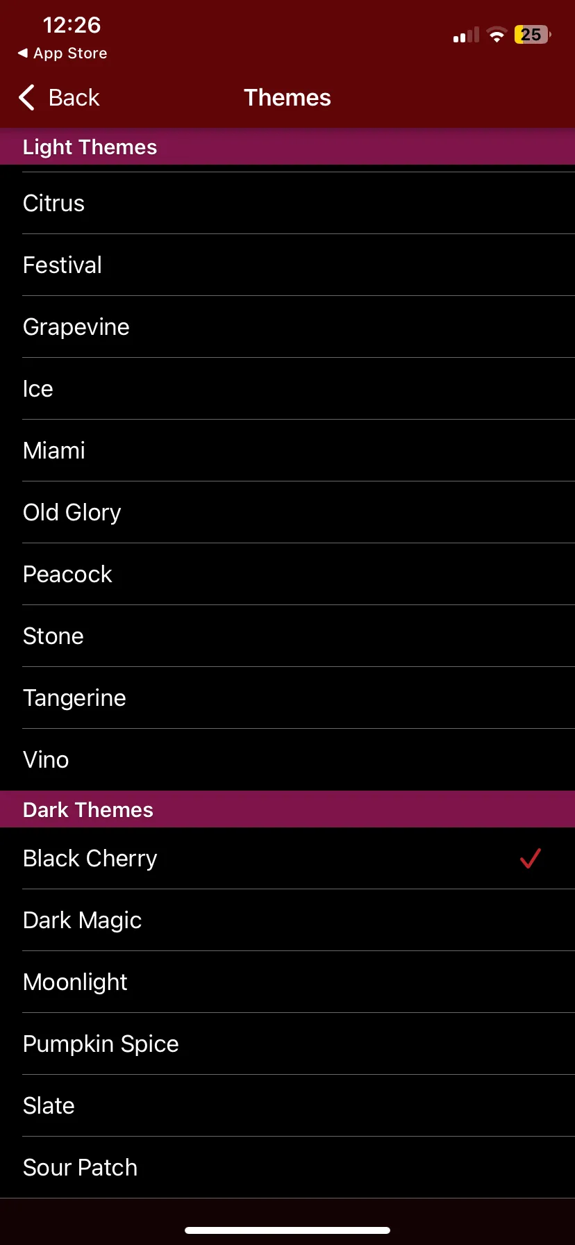 OurGroceries' Themes screen listing light themes including Citrus, Festival, Grapevine, Ice, Miami, Old Glory, Peacock, Stone, Tangerine and Vino, then dark themes including Black Cherry, which is ticked as selected, Dark Magic, Moonlight, Pumpkin Spice, Slate and Sour Patch